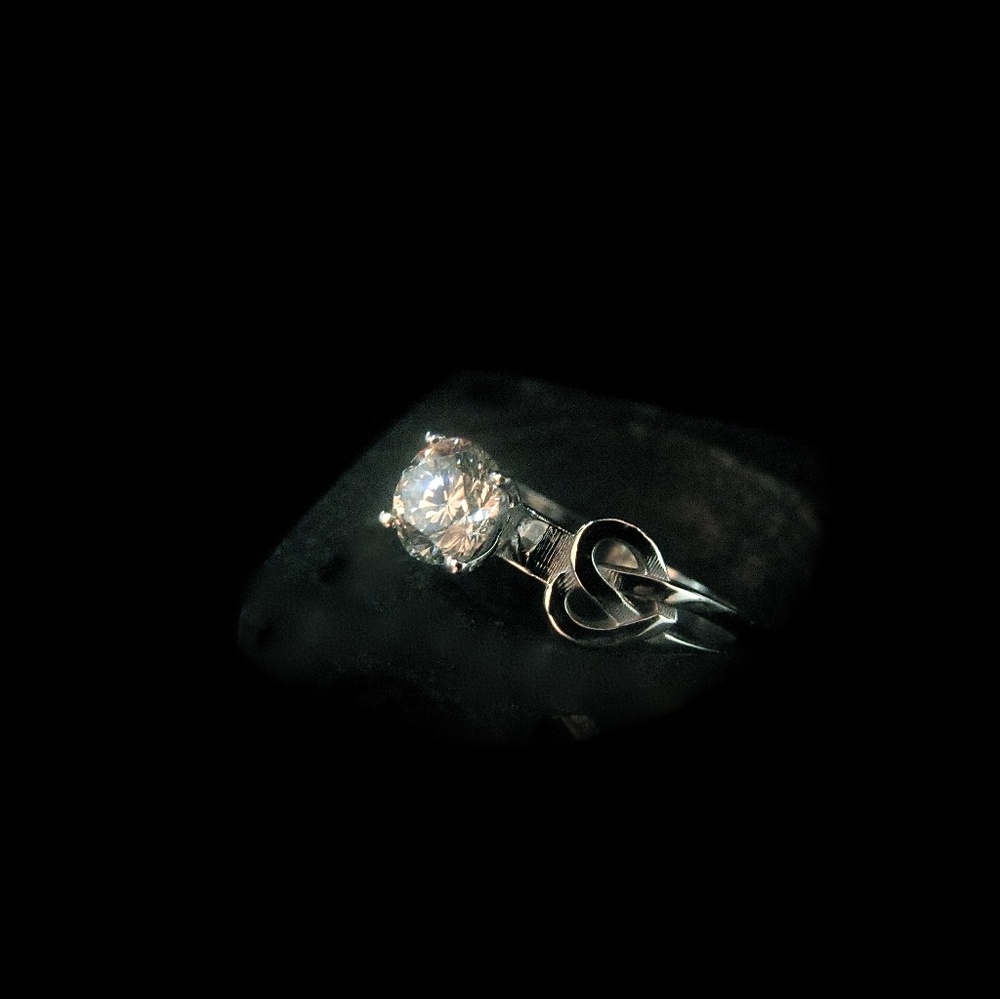 14K white solid gold ring set with 0.48ct Diamond.